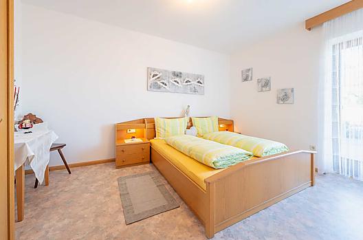 Sypialnia w apartamencie Penegal